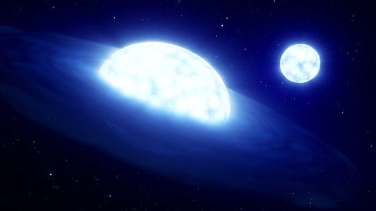 Dos estrellas blanco-azuladas. La más grande, en primer plano, tiene un tenue disco a su alrededor.